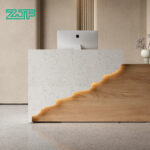 Custom white marble reception desk light wood accents