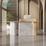 Luxury oval-shaped front desk with Carrara marble and LED lighting